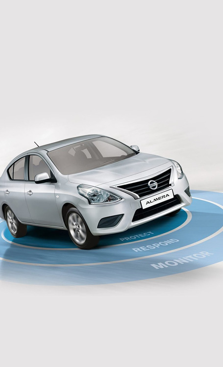Almera parked on blue circles with safety features on it